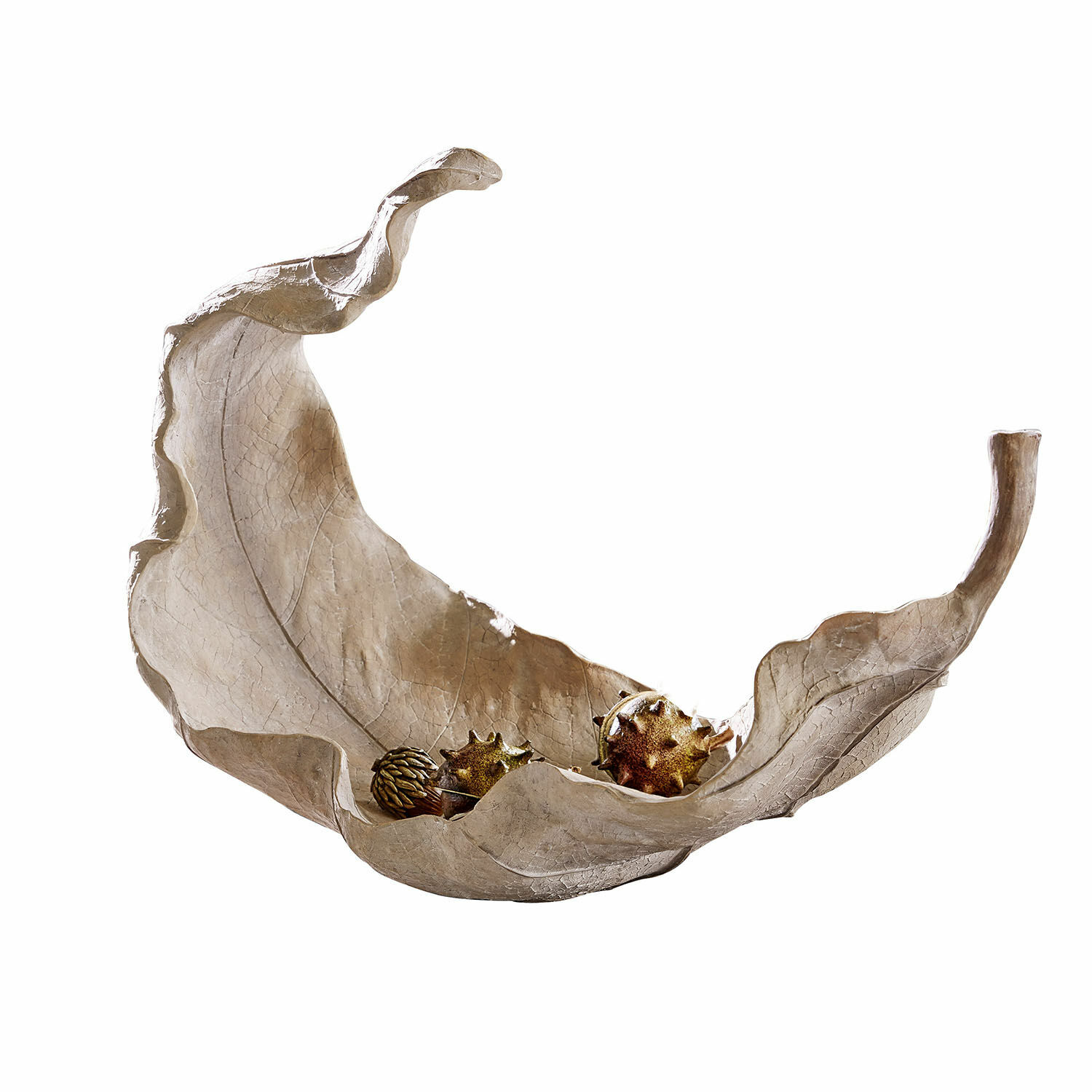 Recipiente Vibius Cuenco decorativo en forma de hoja beige con bolas decorativas sobre mesa