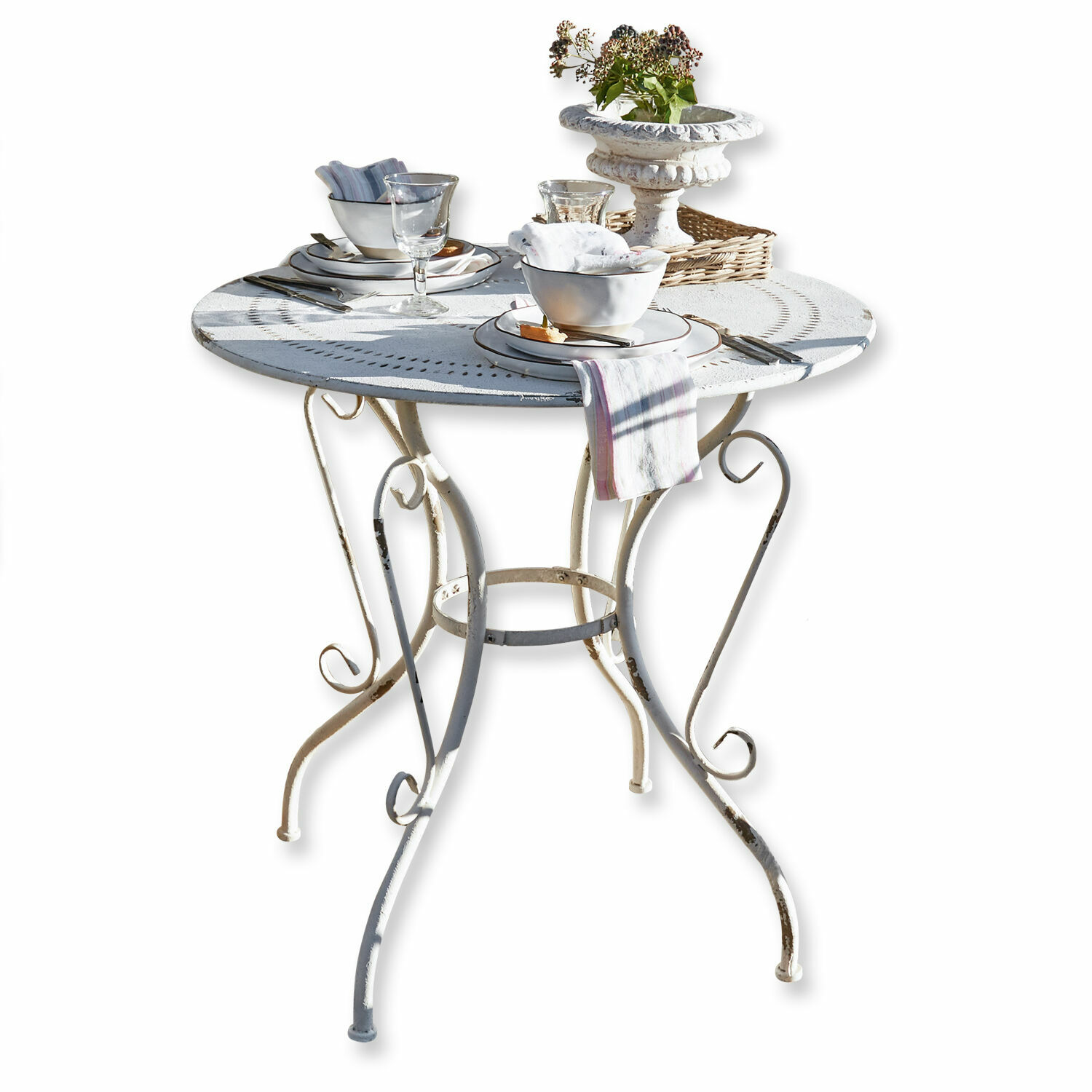 Mesa Aube Mesa redonda de metal blanco con patas decorativas y vajilla, ideal para terraza o balcón