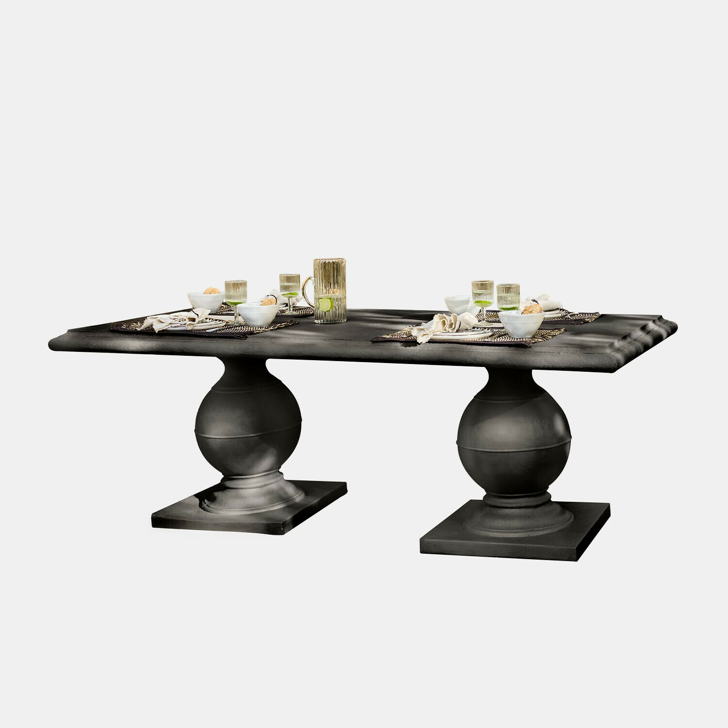 Mesa Talvero Mesa de comedor negra con dos patas esféricas y tablero rectangular con vajilla puesta