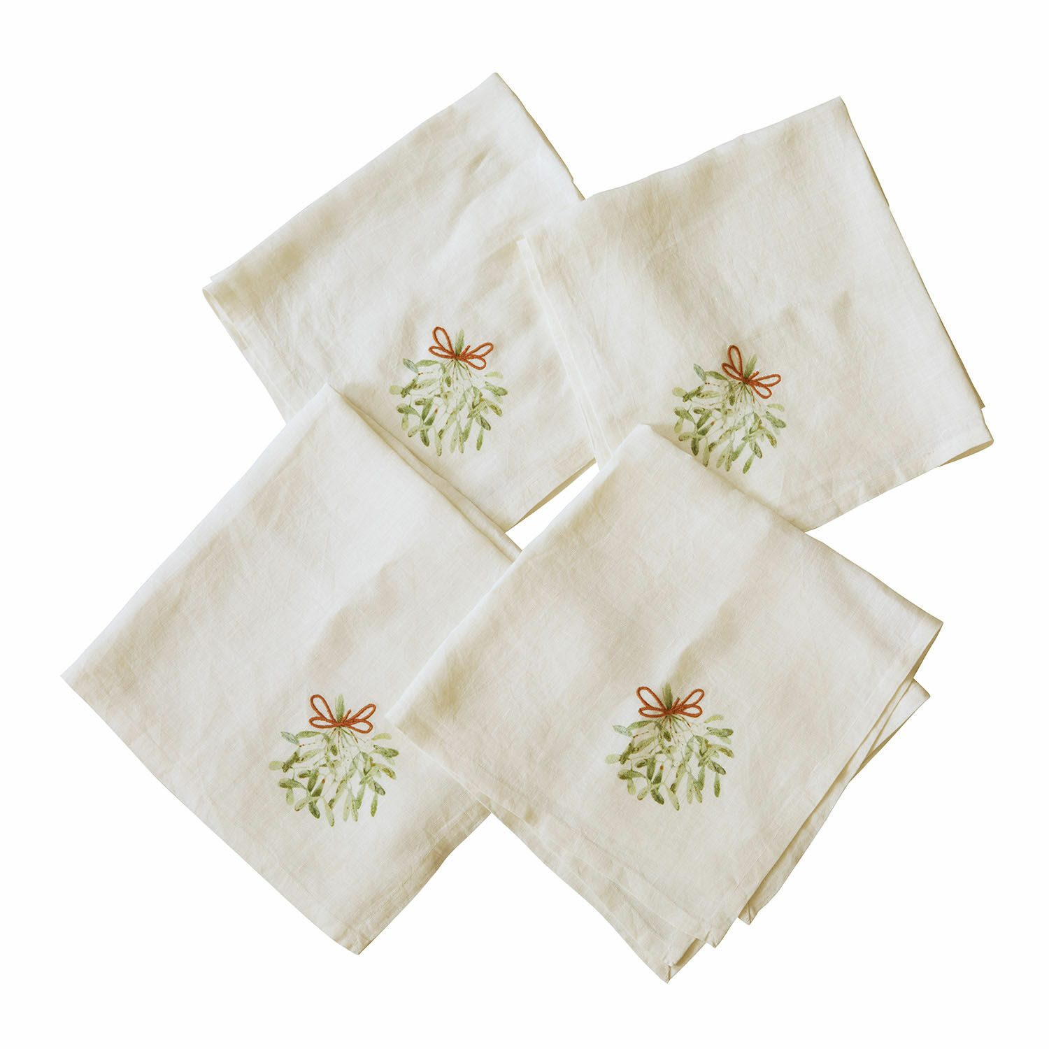 Set de 4 servilletas Mistletoe Conjunto de cuatro servilletas de lino color crudo con bordado de muérdago y lazo rojo para mesa