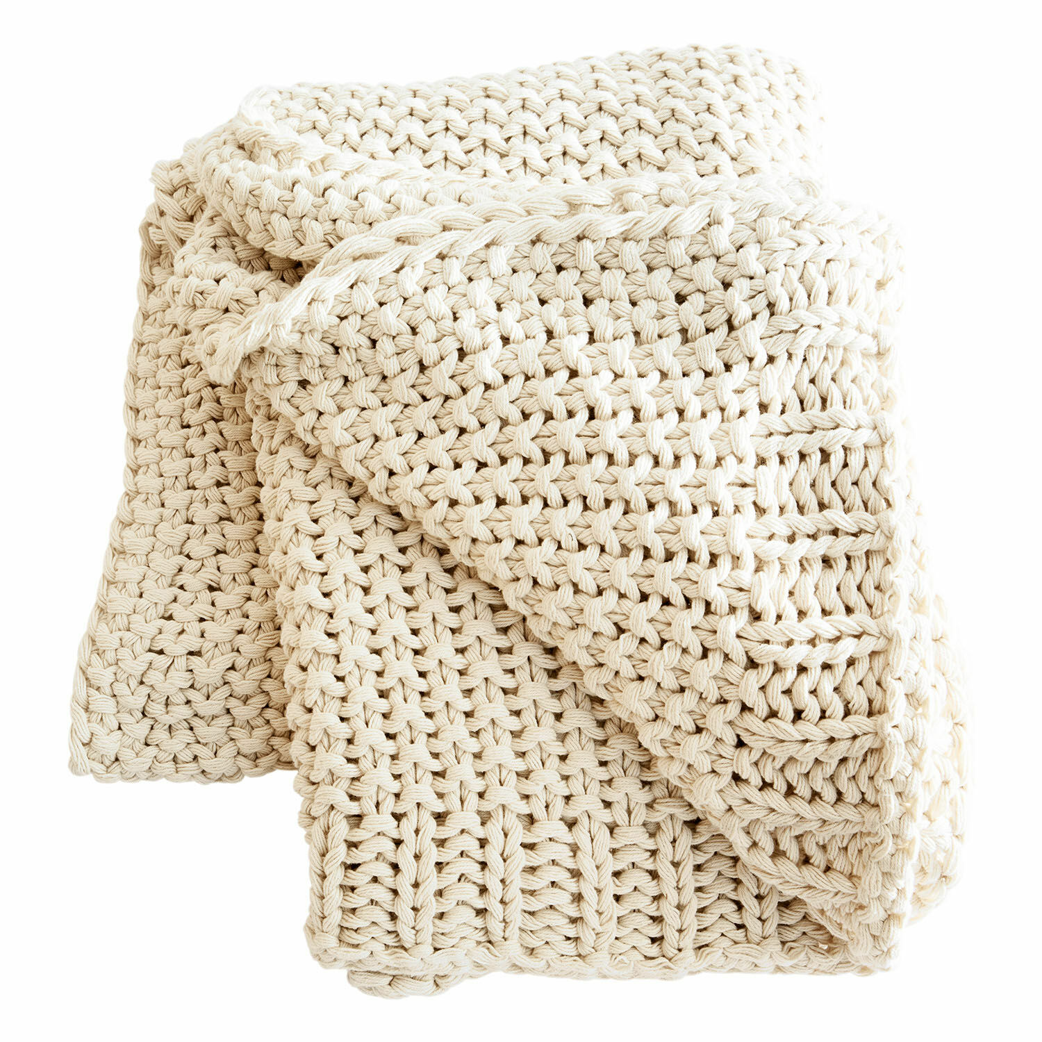 beige Manta beige de algodón grueso tejido, ideal para decorar y aportar calidez al hogar.