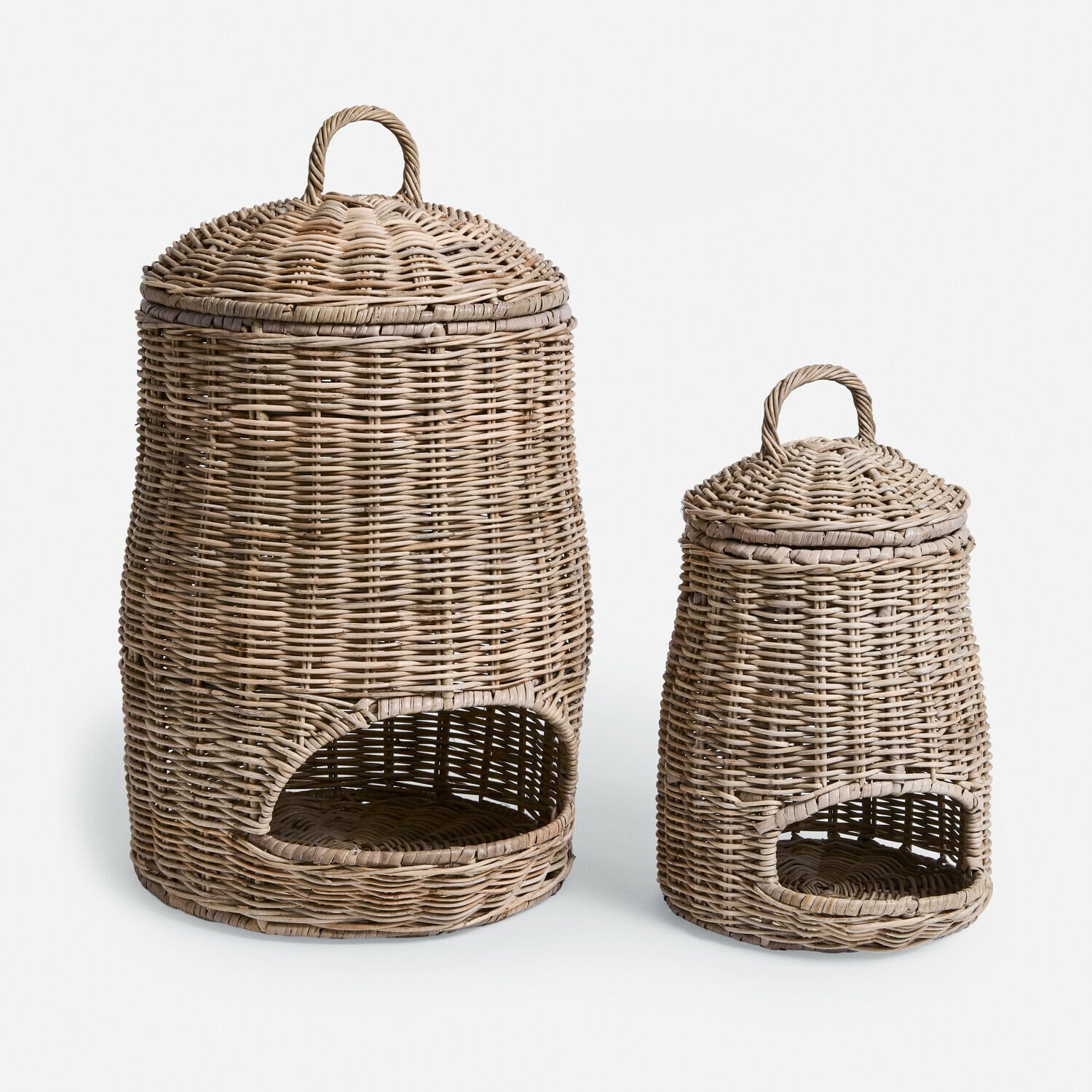 Set de 2 cestas Arovian Dos cestas de mimbre en color natural con asas y aberturas, ideales para almacenamiento y decoración