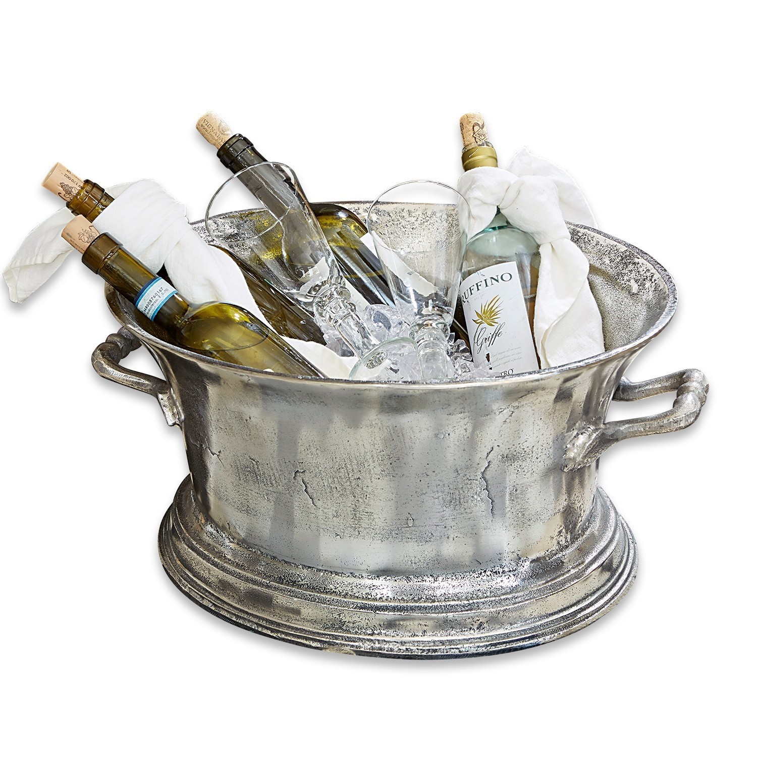 Enfriador de champán Cerisé Cubitera metálica plateada con asas, llena de botellas de vino y copas sobre hielo