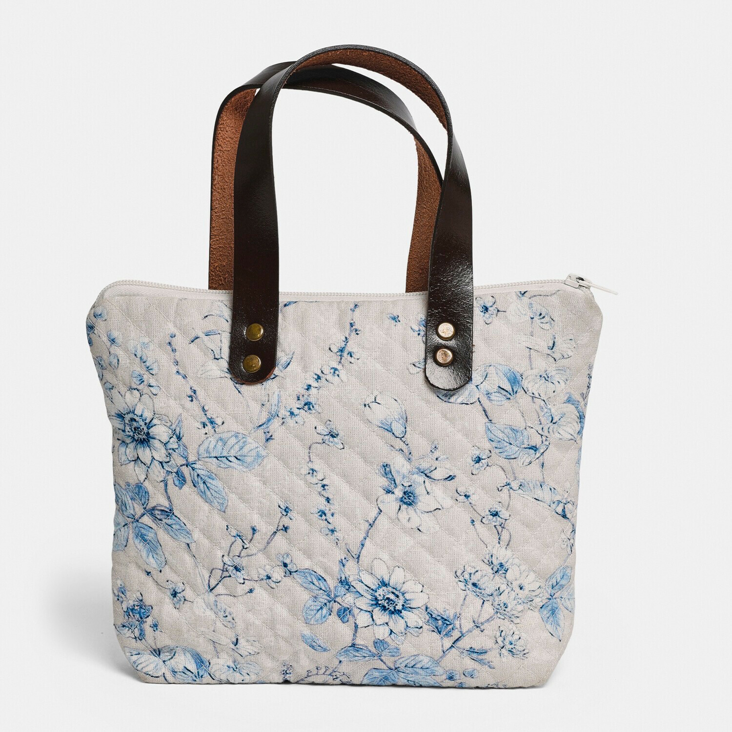 Bolso Vailenne Bolso acolchado beige con estampado floral azul y asas de cuero negro, accesorio de moda
