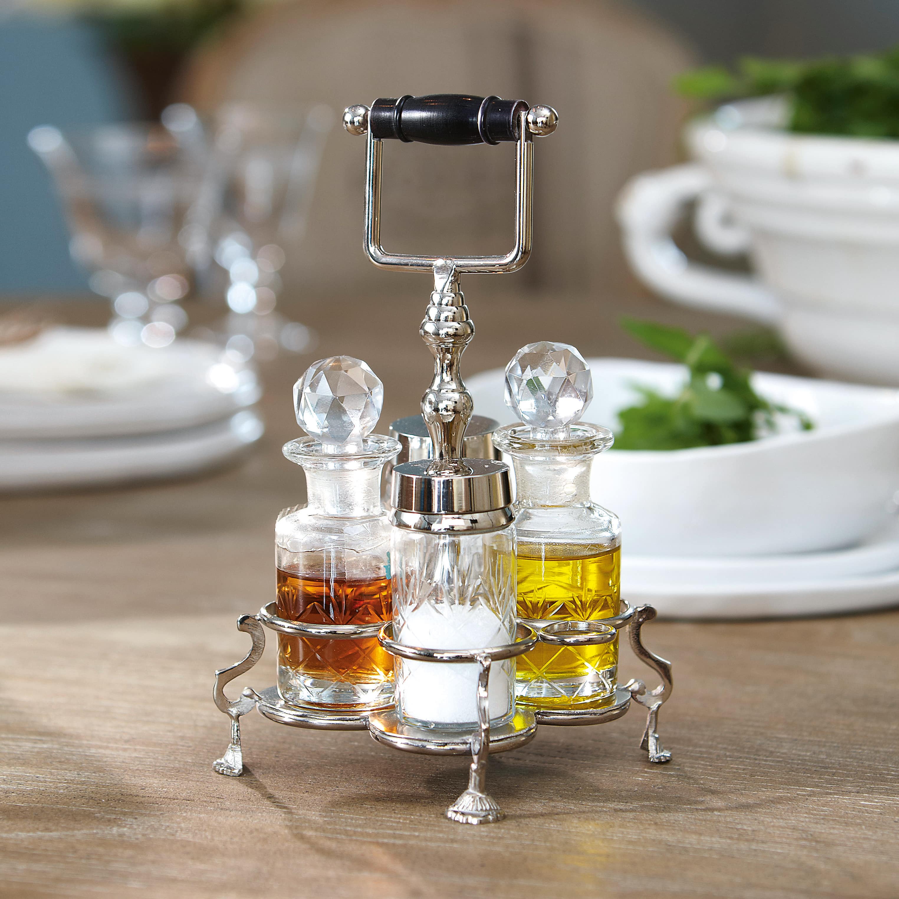 Set de condimentos con botellas de cristal para aceite, vinagre y sal en soporte metálico para mesa