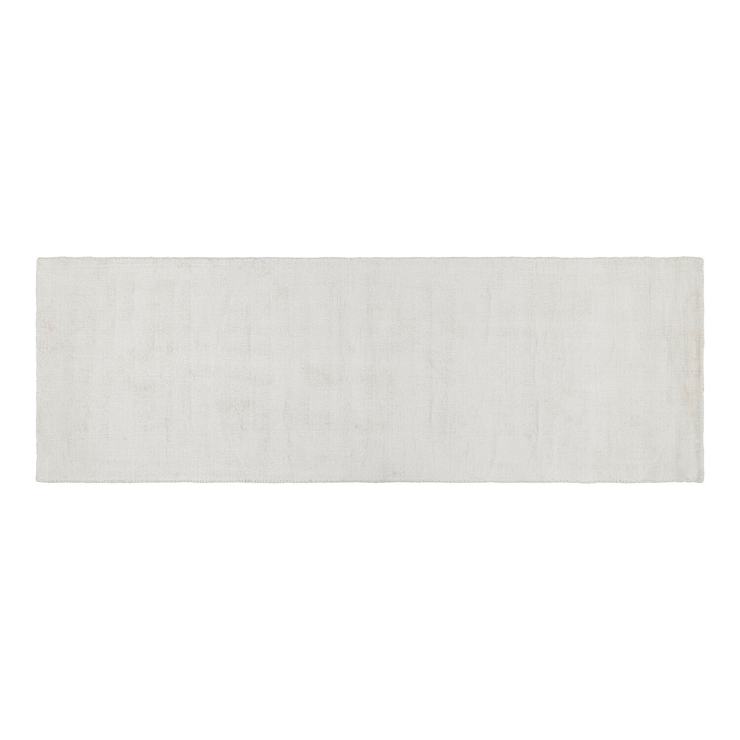 Alfombra rectangular blanca de material suave, ideal para interiores modernos