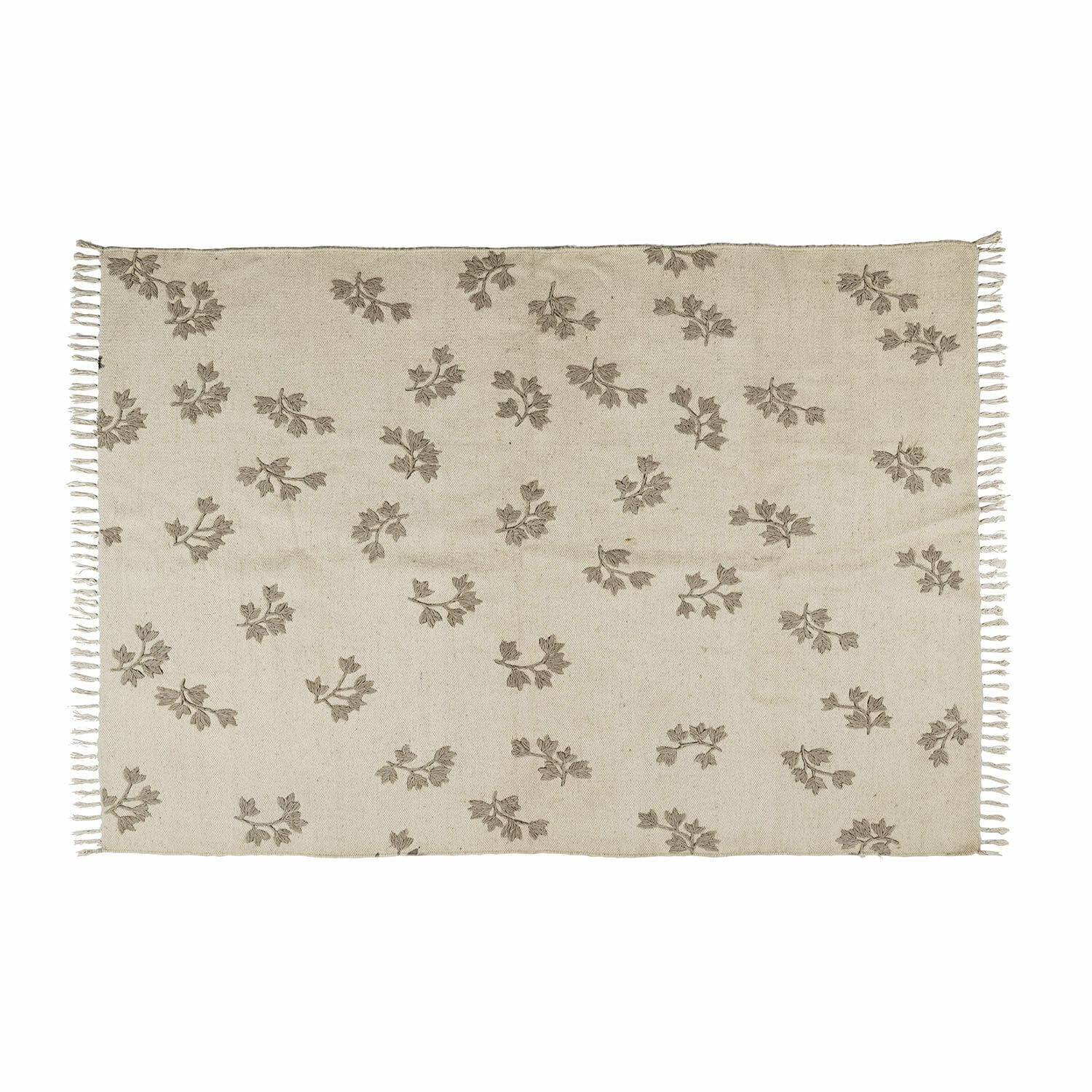 Alfombra beige de algodón con diseño de hojas marrones y flecos, decorativa y natural