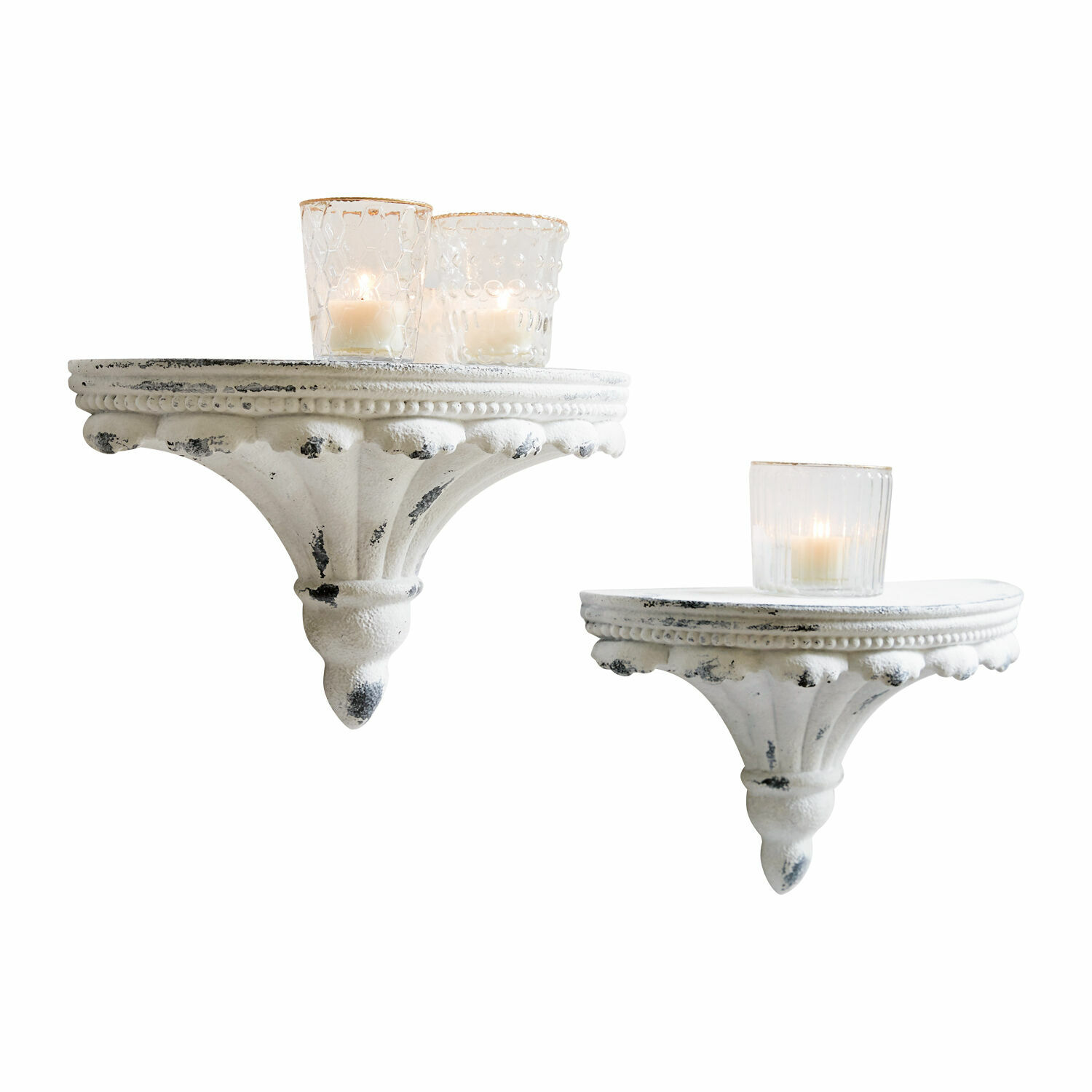 Set de 2 estantes de pared Liara Conjunto de dos estantes de pared blancos de metal envejecido con portavelas decorativos de vidrio