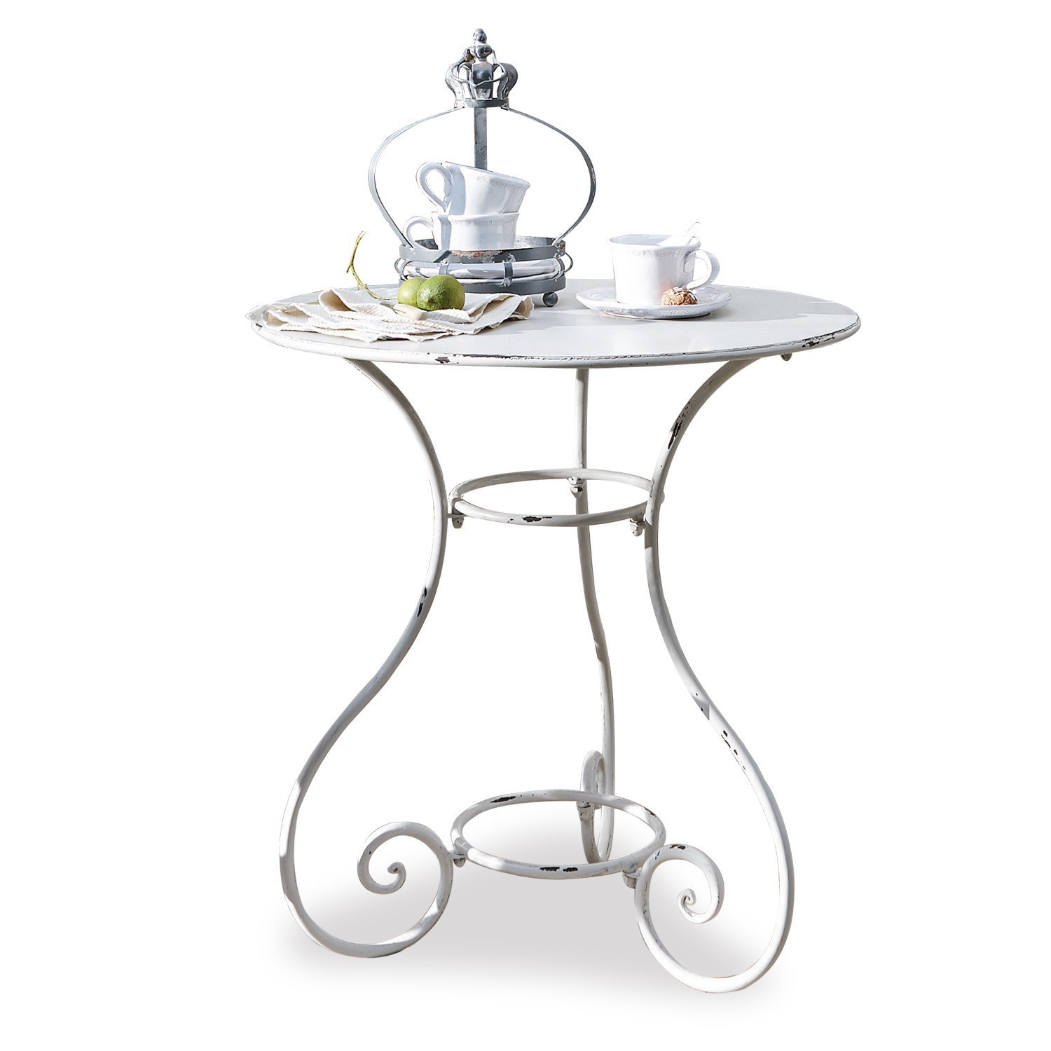 Mesa Iteuil Mesa redonda blanca de metal con patas decorativas y tazas de café sobre la superficie