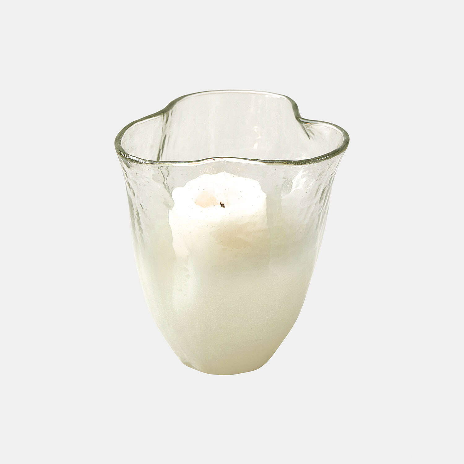 Portavelas Vérolines Portavelas de vidrio blanco con forma irregular y vela blanca en su interior, decoración