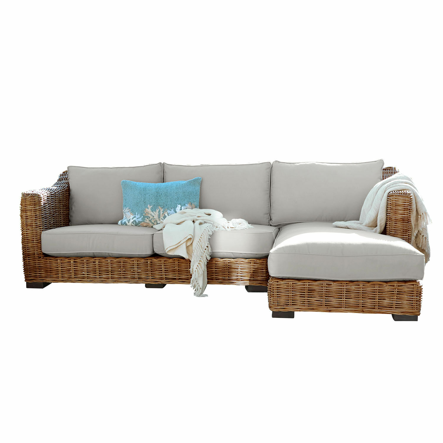 gris/marrón Sofá Villedieu de ratán marrón con cojines grises y cojín decorativo azul claro