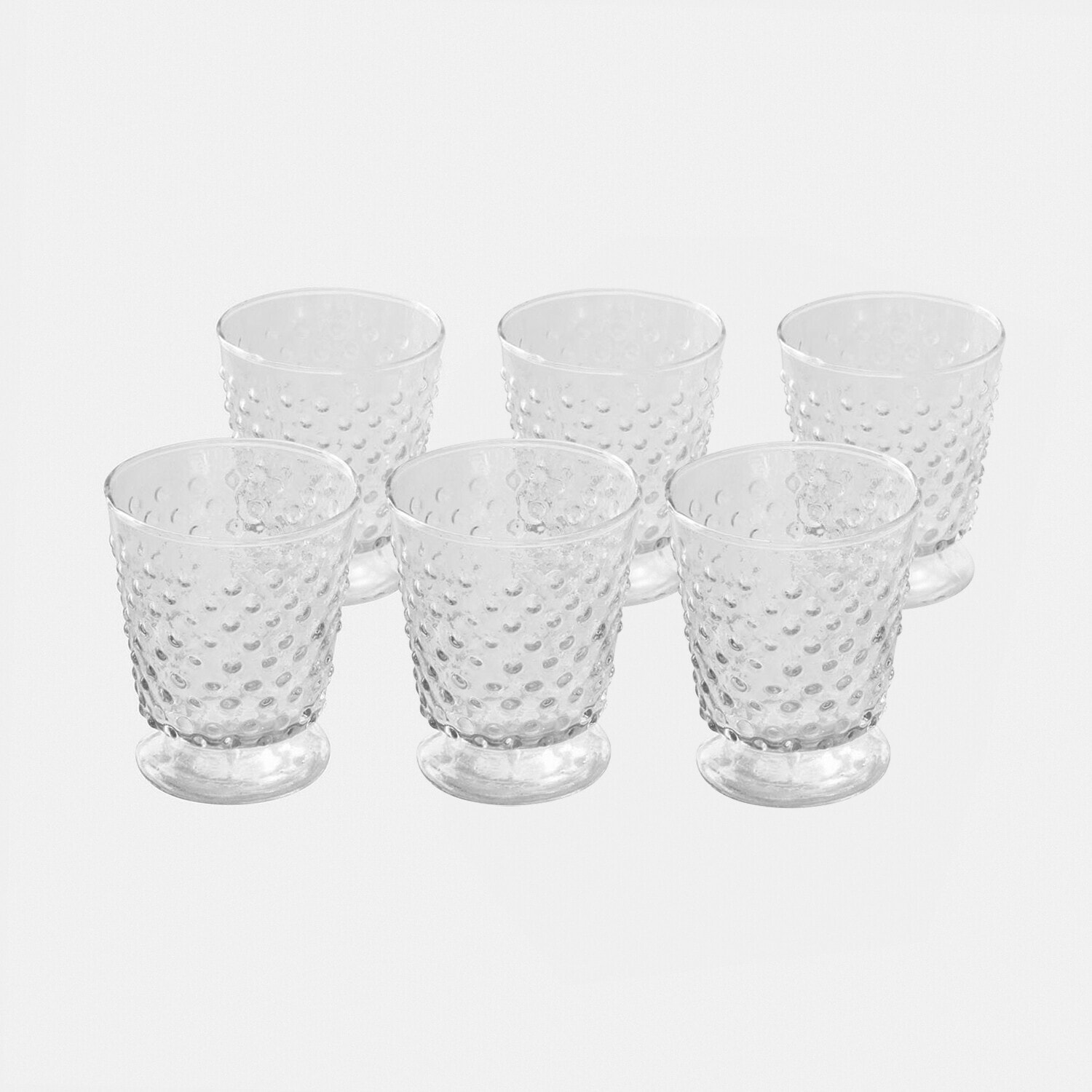 Juego de seis vasos transparentes de vidrio con diseño en relieve, ideales para bebidas