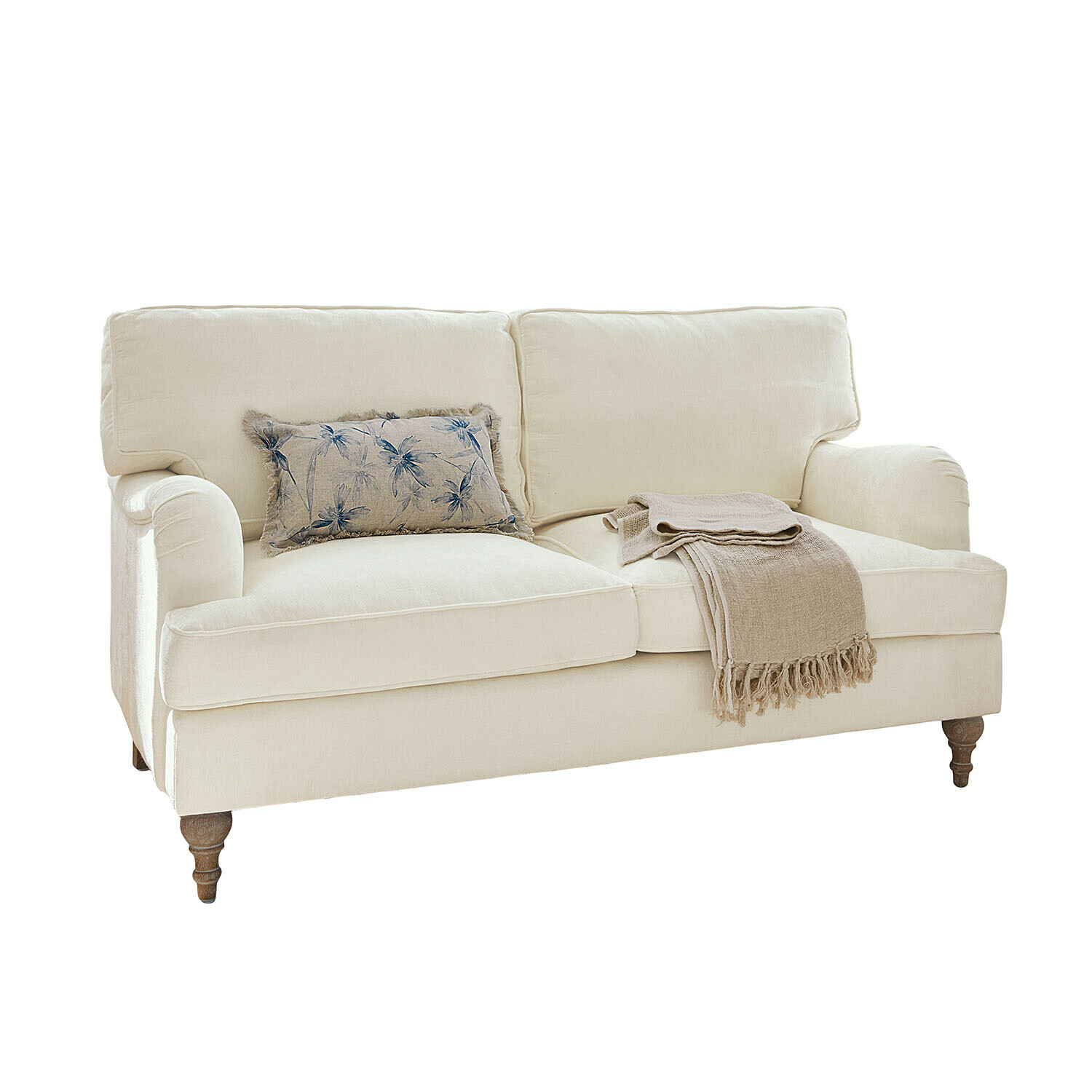 Sofá Elvika Sofá beige de tela con cojín floral azul y manta beige sobre patas de madera torneadas