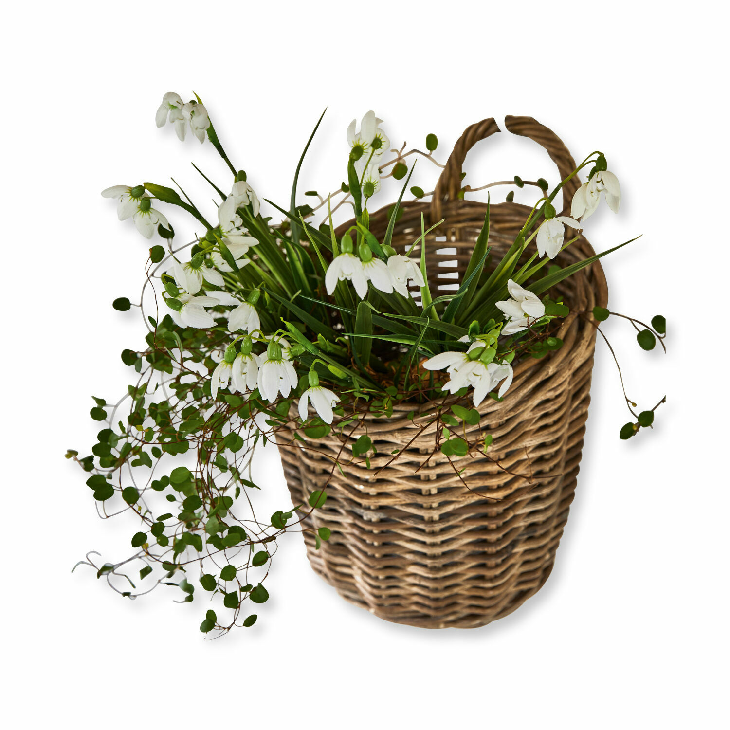 Cesta Korovu Cesta de mimbre con flores blancas y hojas verdes, decoración primaveral para interiores