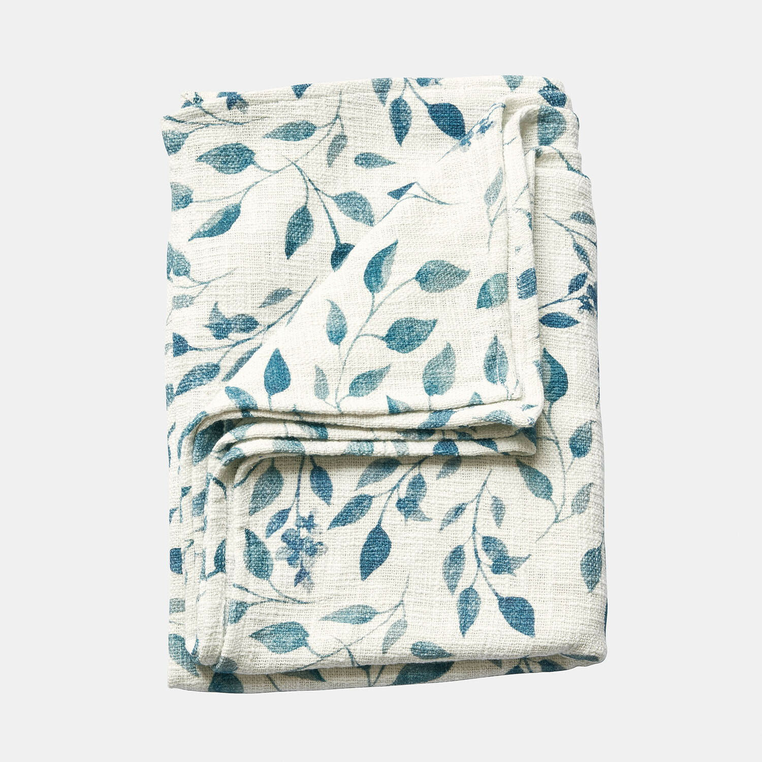 Manta blanca plegada con diseño de hojas azules, tejido suave, accesorio textil decorativo para el hogar