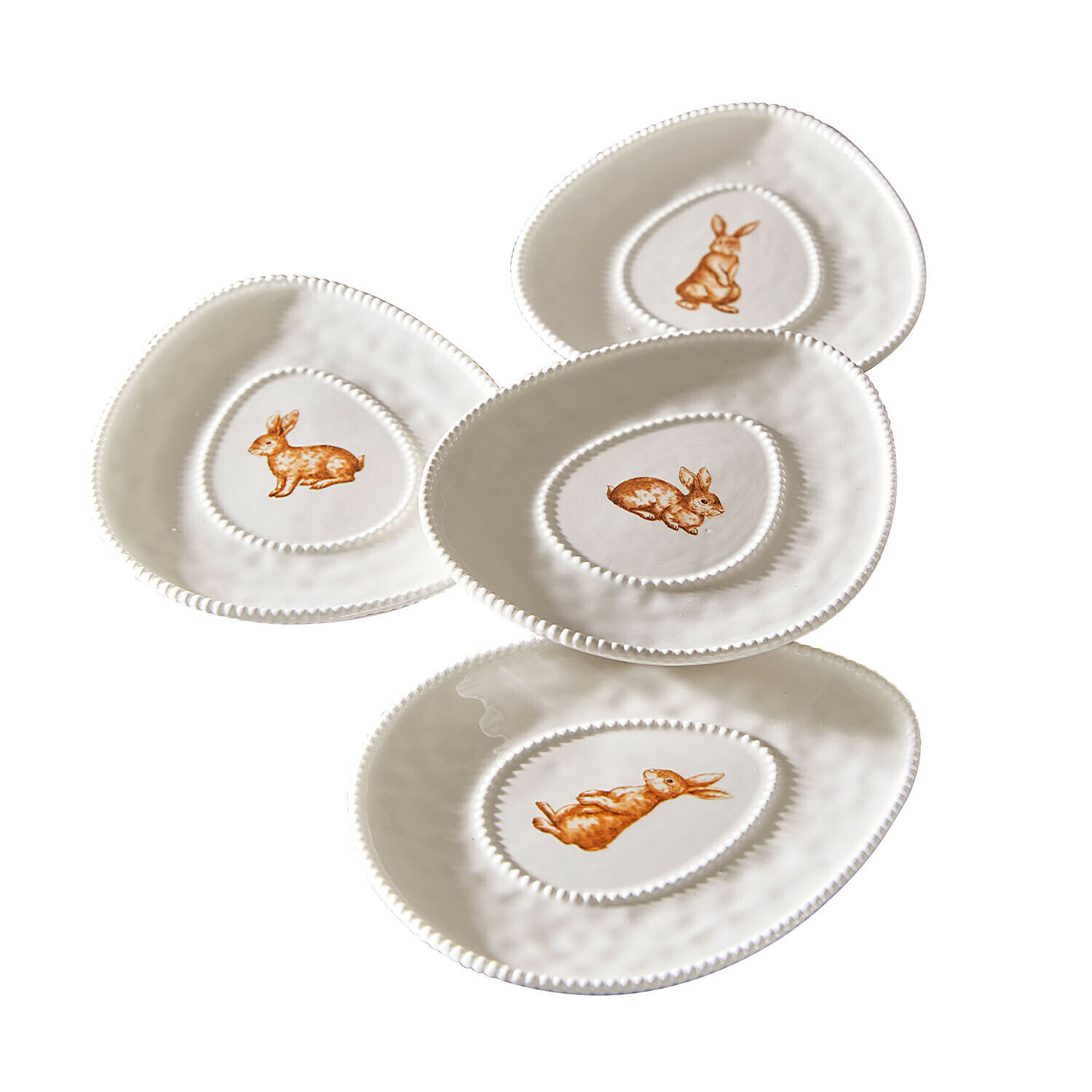 Set de 4 platos Seravoux Juego de cuatro platos blancos de cerámica con motivos de conejos marrones, vajilla decorativa