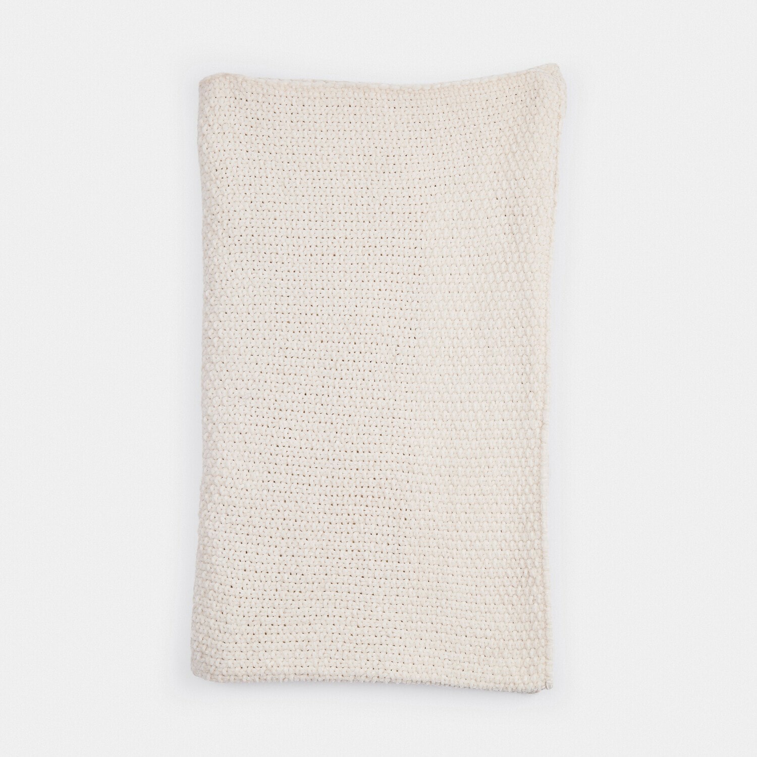 Manta crema tejida a mano con hilo suave, perfecta para un ambiente acogedor y decoración del hogar