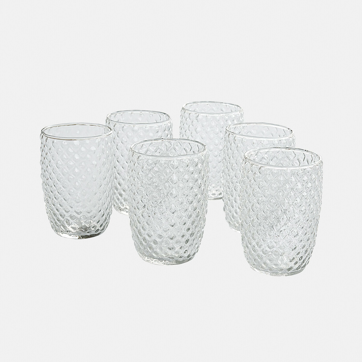 Set de 6 vasos Ivorias Juego de seis vasos transparentes de vidrio texturizado con diseño de diamante para bebidas
