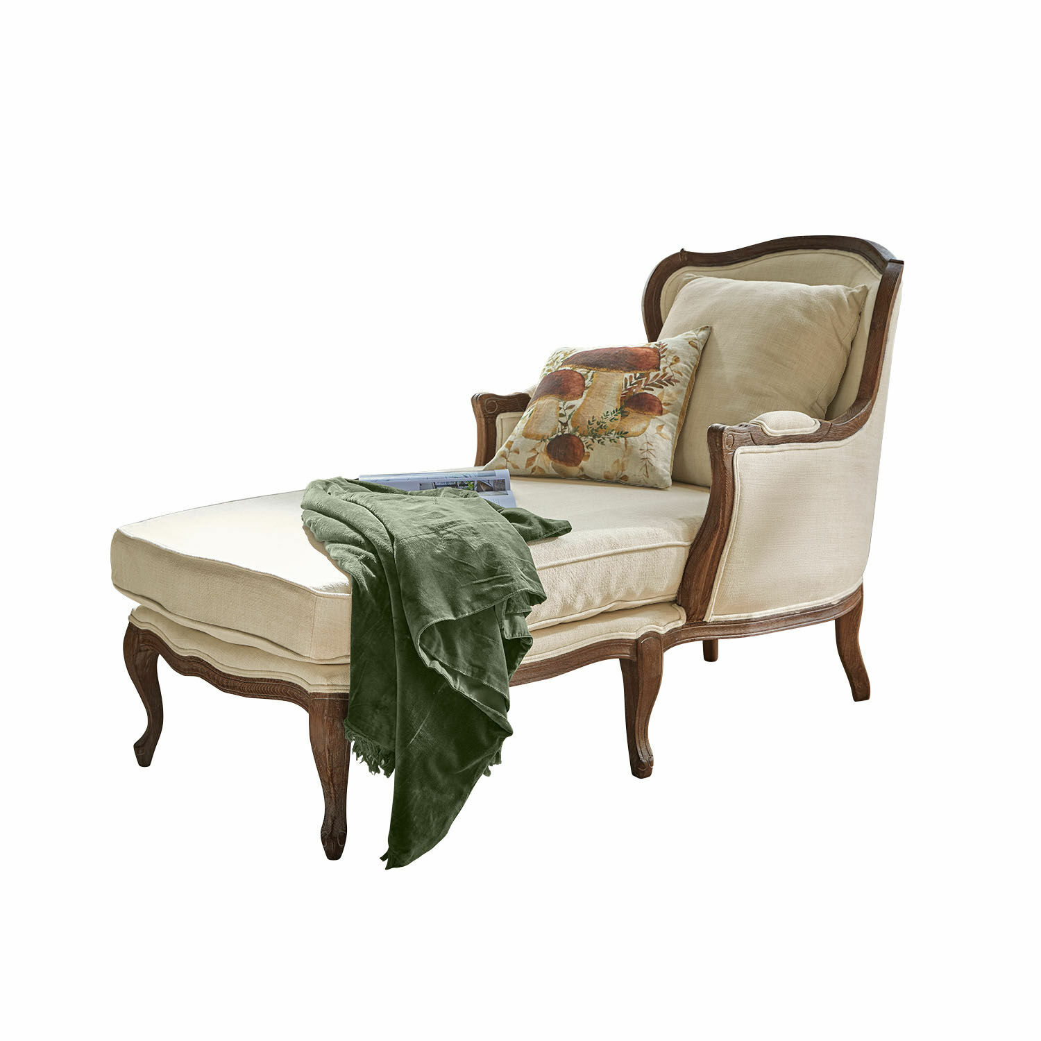 Chaise longue Muel Chaise longue elegante con tapizado beige y marco de madera, manta verde y cojín decorativo con setas