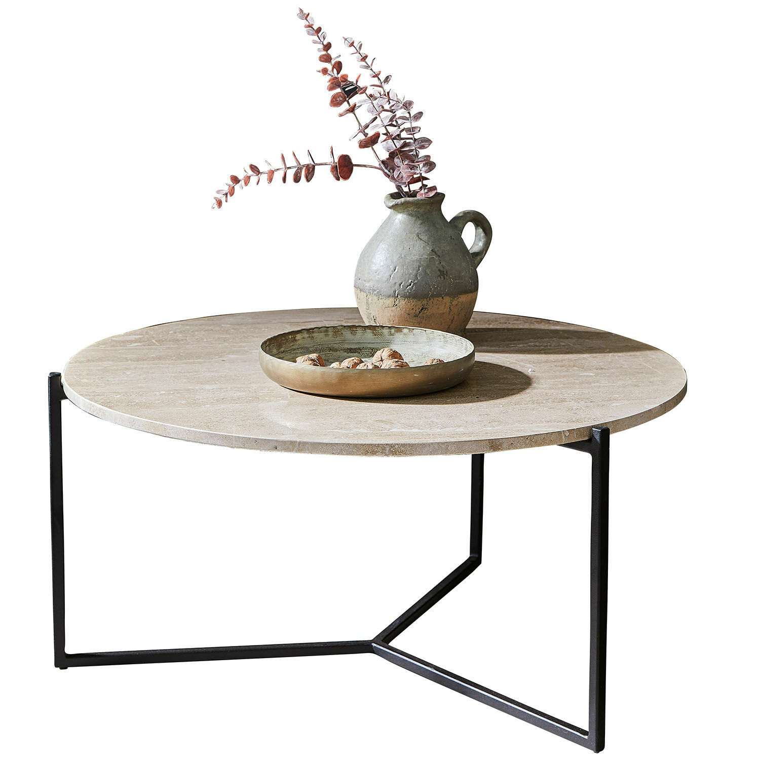 Mesa de centro Émorieux Mesa de centro redonda con superficie de mármol beige y base metálica negra, decorada con jarrón y bandeja