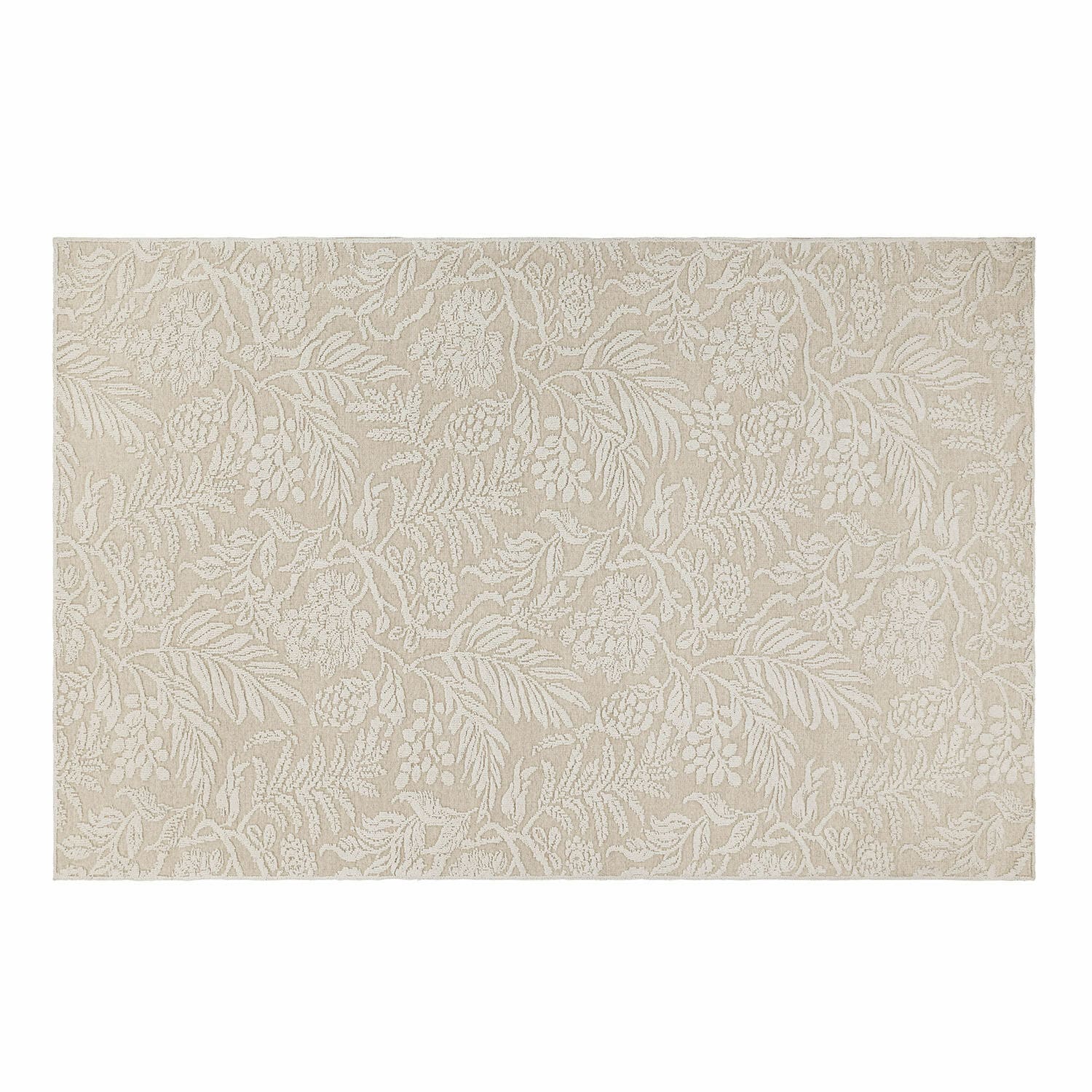 Alfombra beige de algodón con delicado diseño floral, ideal para decoración de interiores