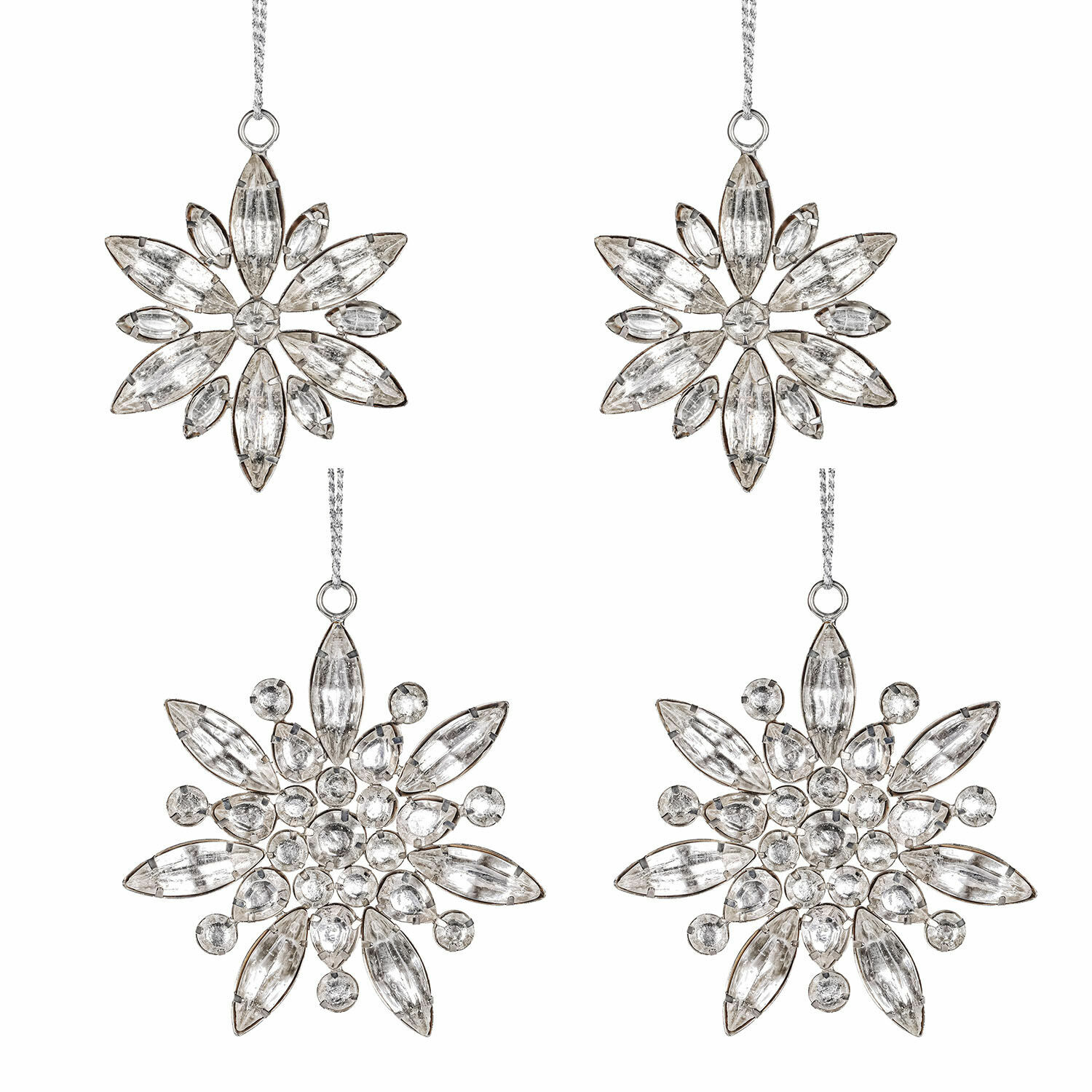 Set de 4 colgantes de Navidad Orvalie Conjunto de cuatro adornos navideños en forma de estrella de vidrio transparente y metal