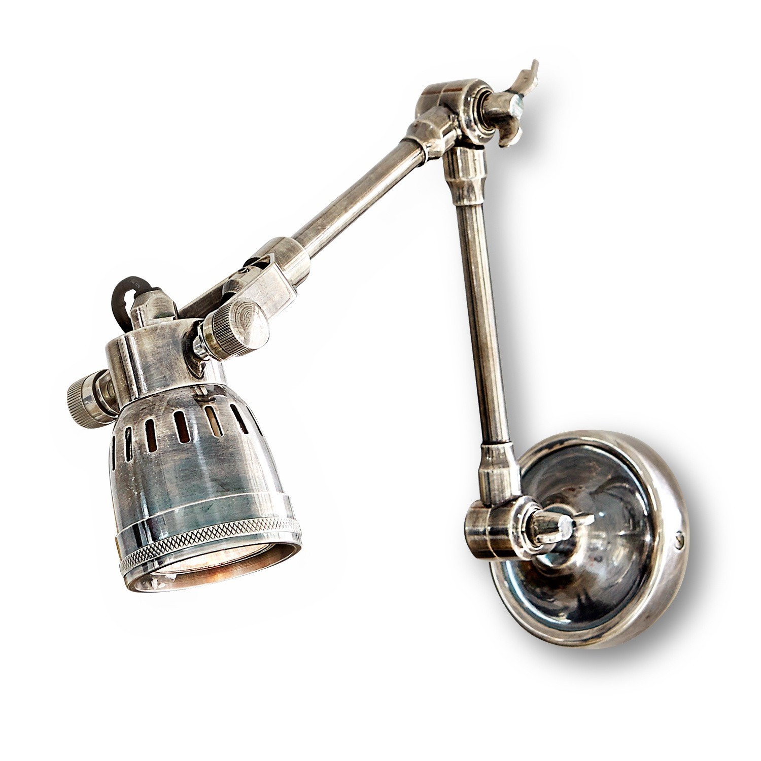 Lámpara de pared Abagail ajustable en metal color plata antigua con brazo articulado