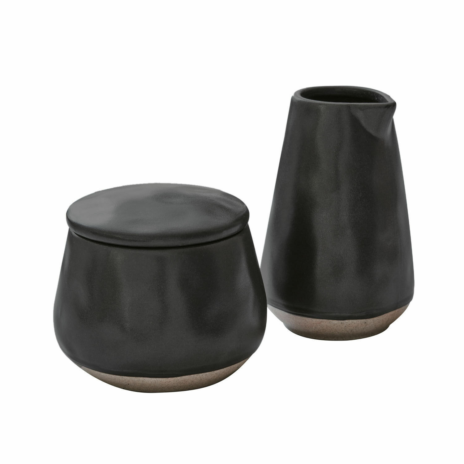 Azucarero y jarra de leche de cerámica negra con base beige para cocina moderna