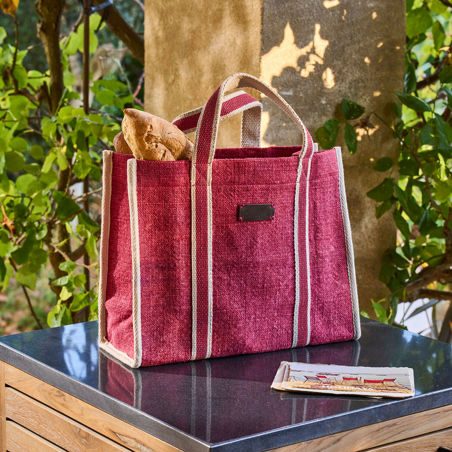 Bolso Norisse Bolsa de compras roja de material natural con franjas claras, ideal para pan y compras diarias