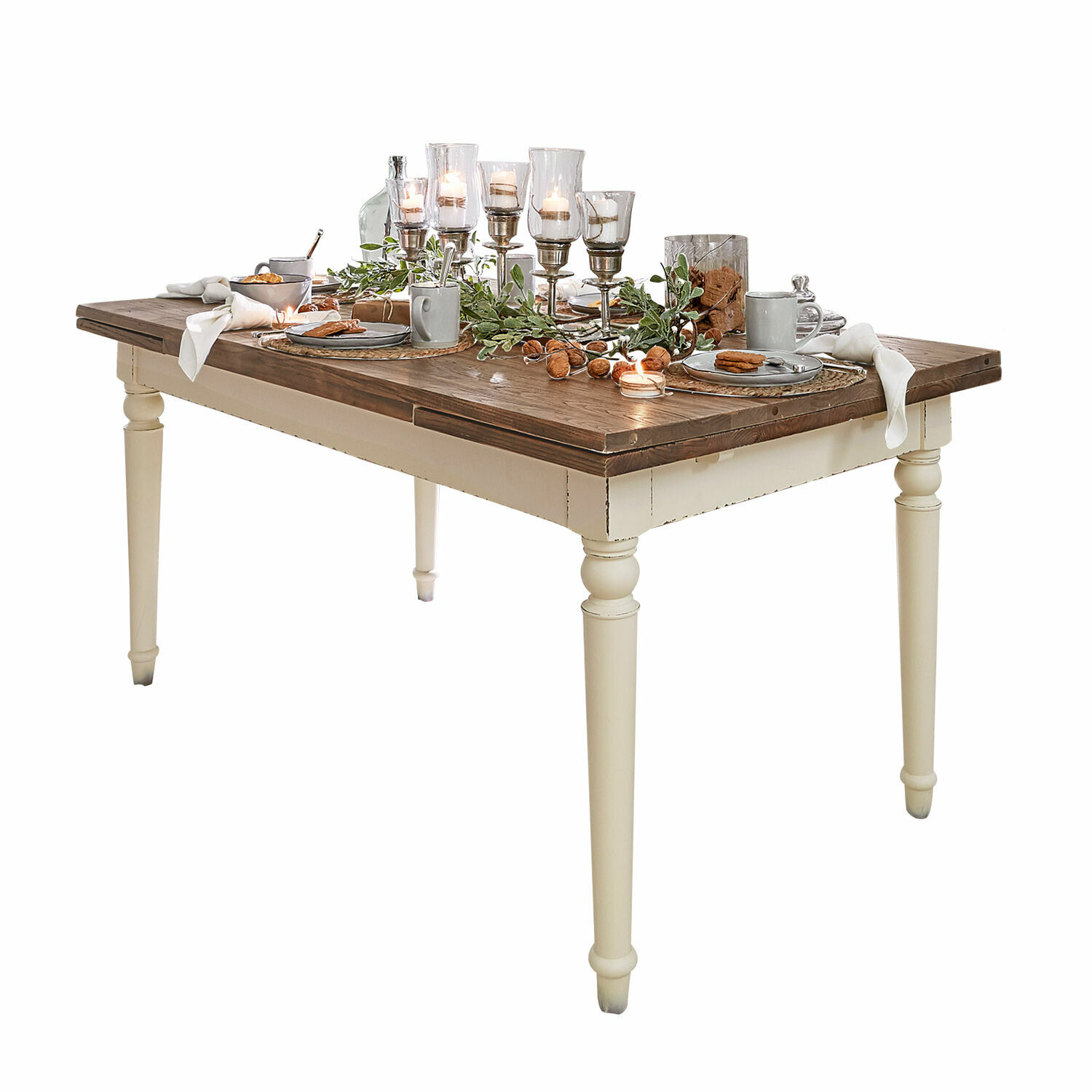 Mesa Bradford Mesa de comedor con tablero de madera marrón y patas crema, decorada con velas y vajilla