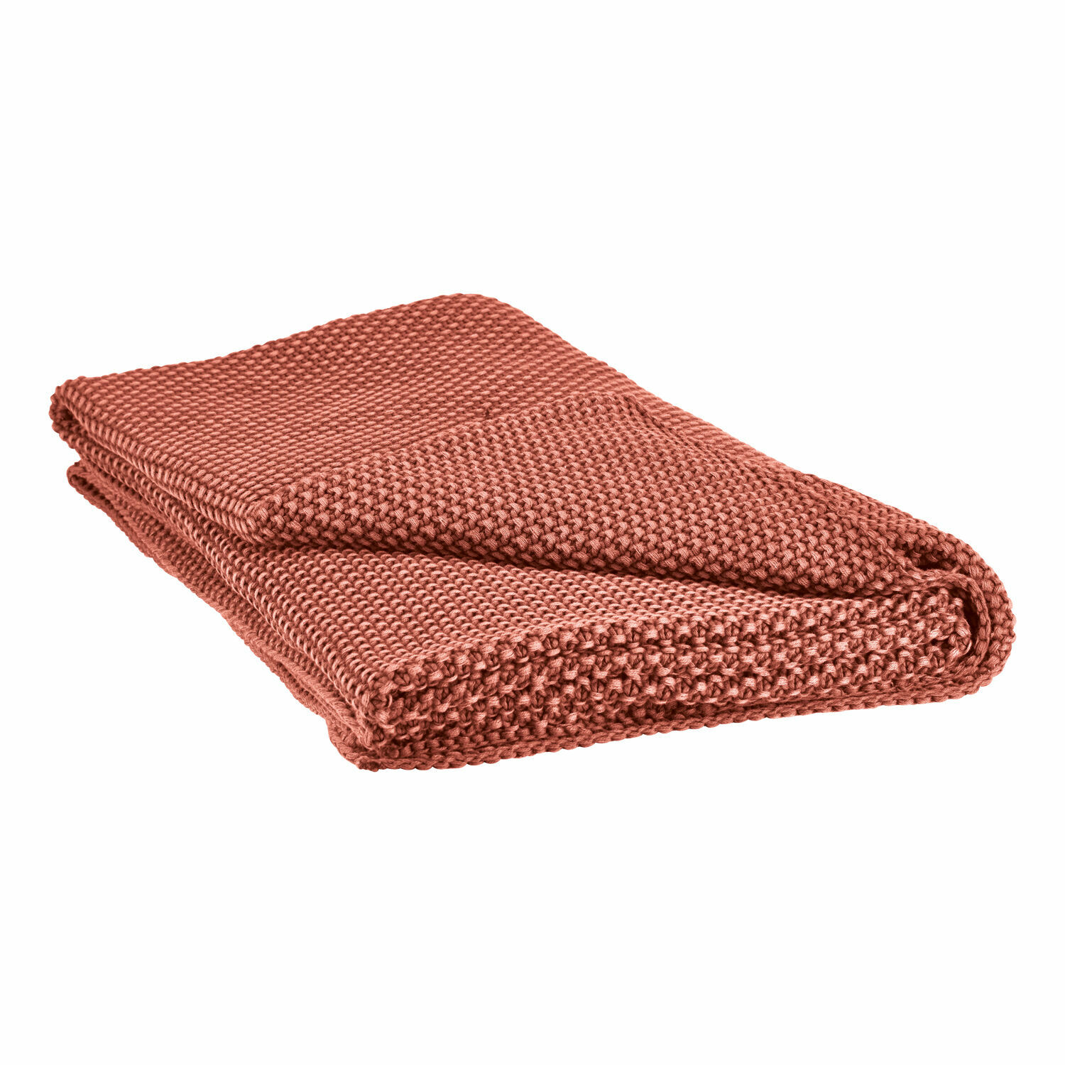 Manta Amberley color óxido de material suave, perfecta para un ambiente acogedor en casa.
