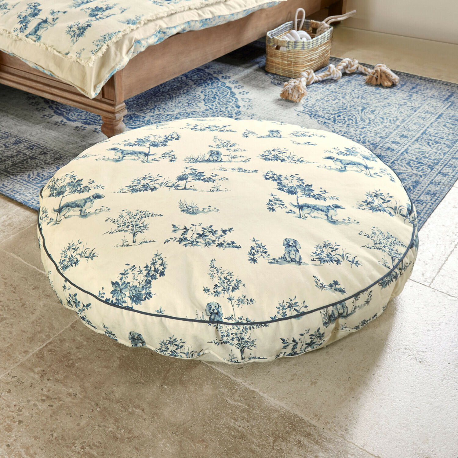Cojín redondo de suelo de algodón color crema con estampado azul de perros y plantas, decorativo y cómodo