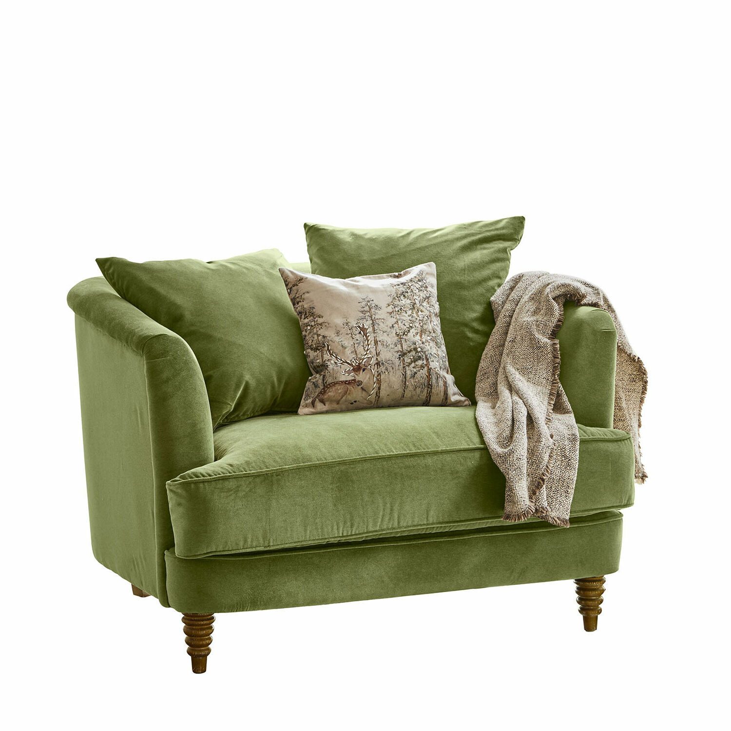 Sofá verde de tela suave con cojines y manta beige, mueble cómodo para sala de estar
