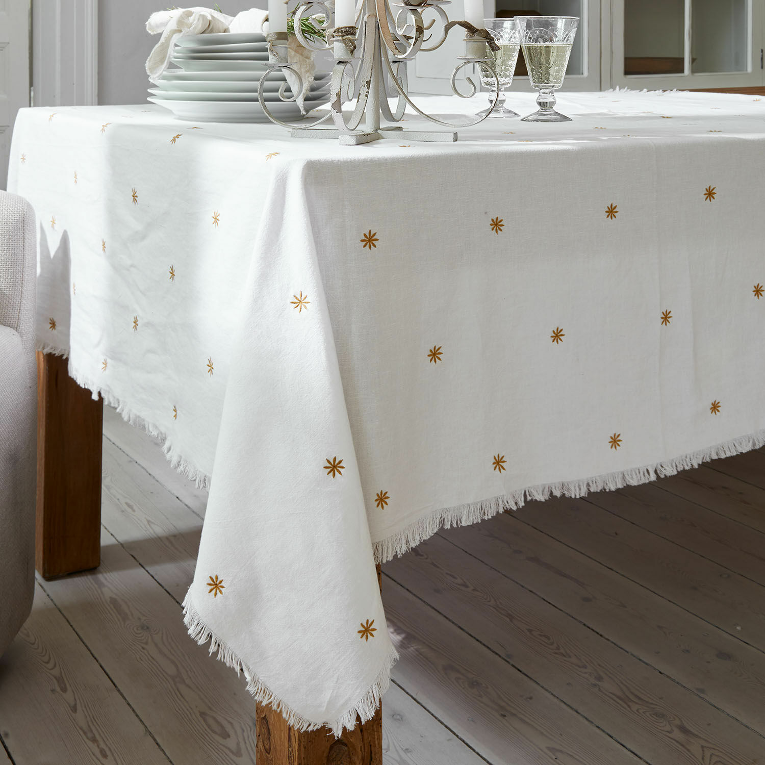 Mantel Fjalara Mantel de lino blanco con flecos y estrellas doradas, decoración elegante para mesa