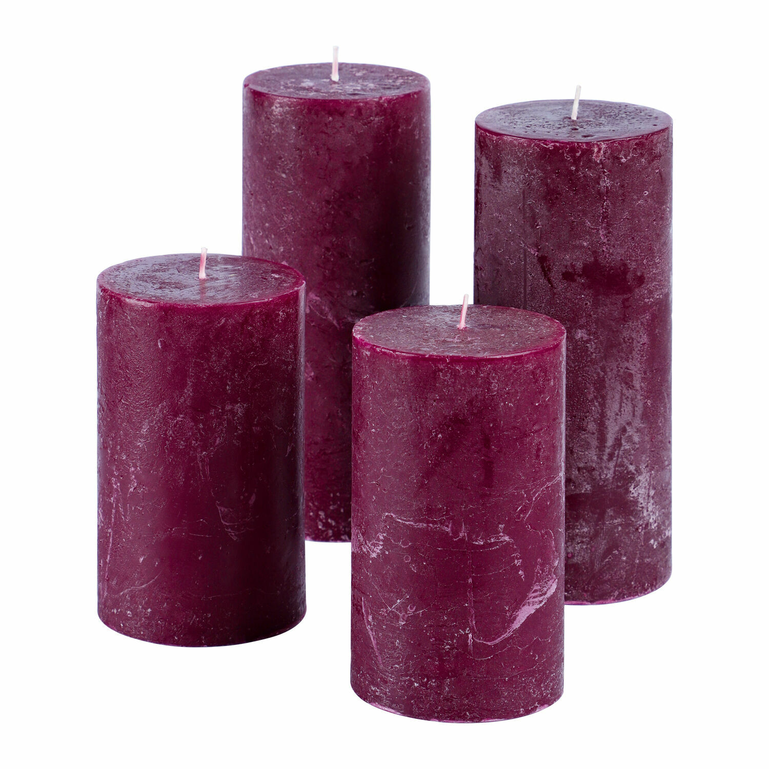 Set de 4 velas Berekua moradas de cera con textura rústica para decoración interior