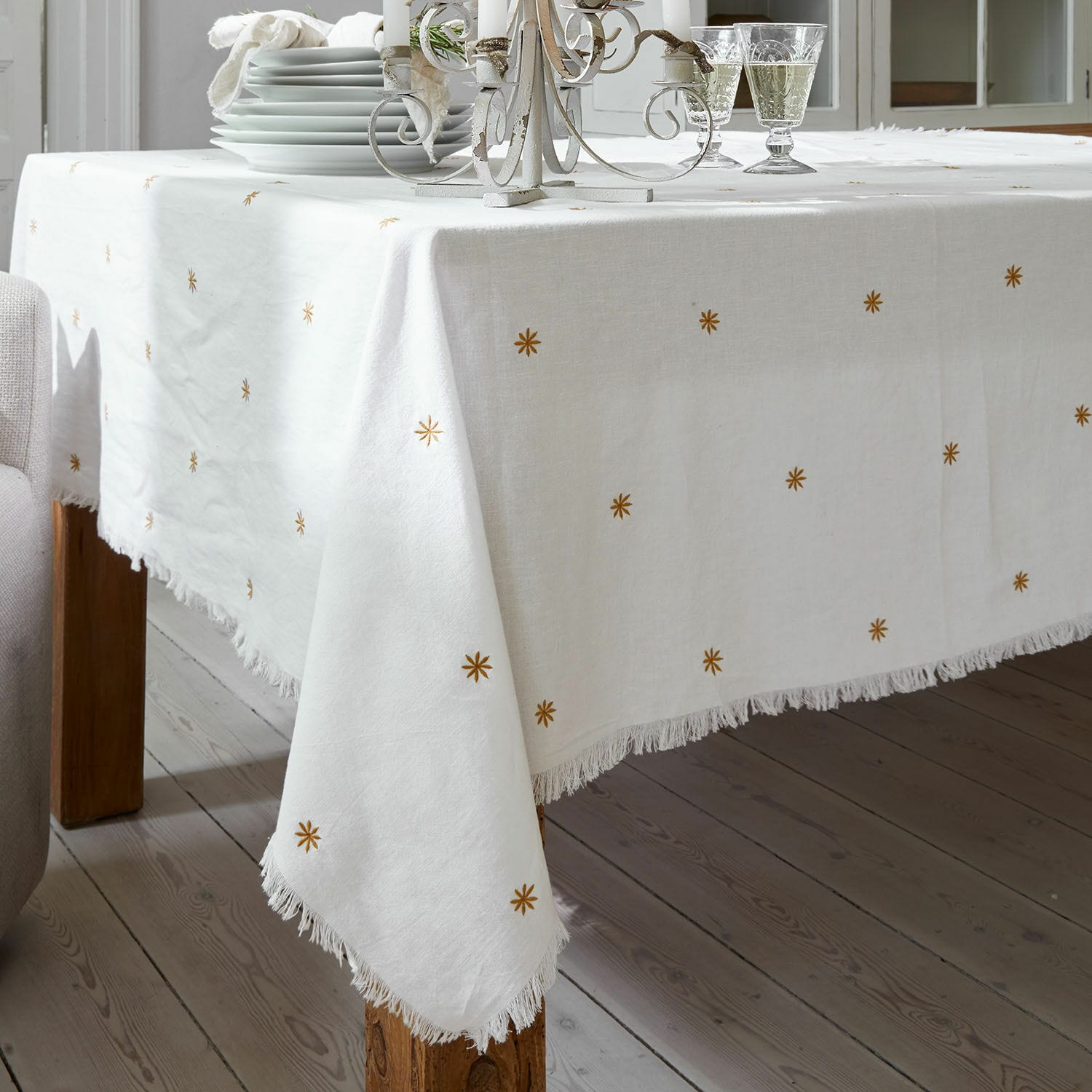 Mantel Fjalara Mantel de lino blanco con flecos y estrellas doradas, decoración elegante para mesa