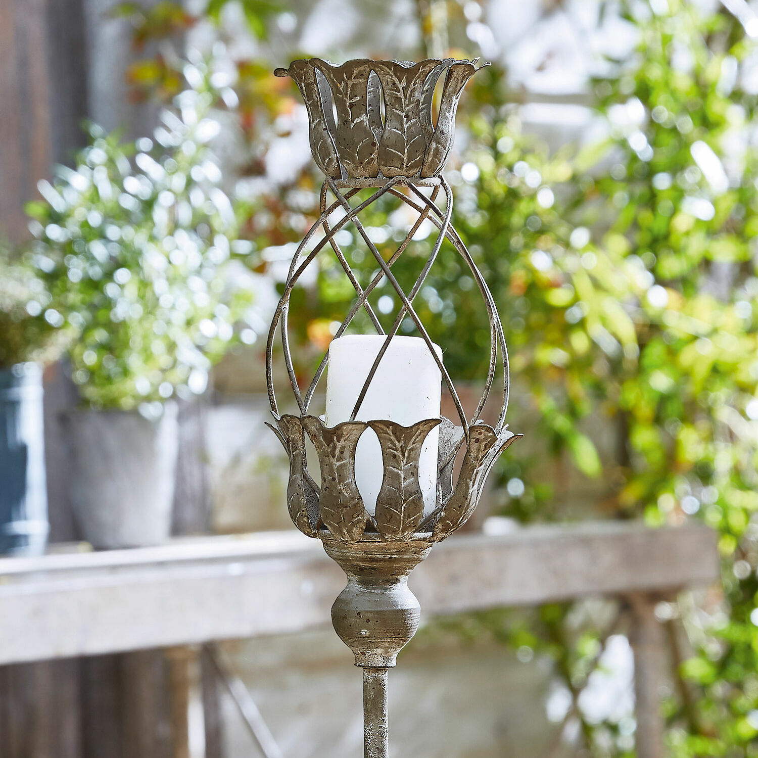 Farol Ciranne Portavelas de metal con vela blanca en estilo rústico para decoración interior y jardín
